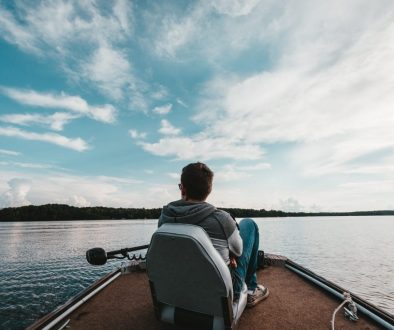 Man sitting on Bass Boat Bench